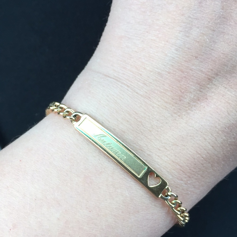 Golden bracelet marked “Autumn” 7 inches
